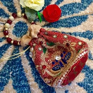 Mini Embroidered drawstring wristlet 💋🎉